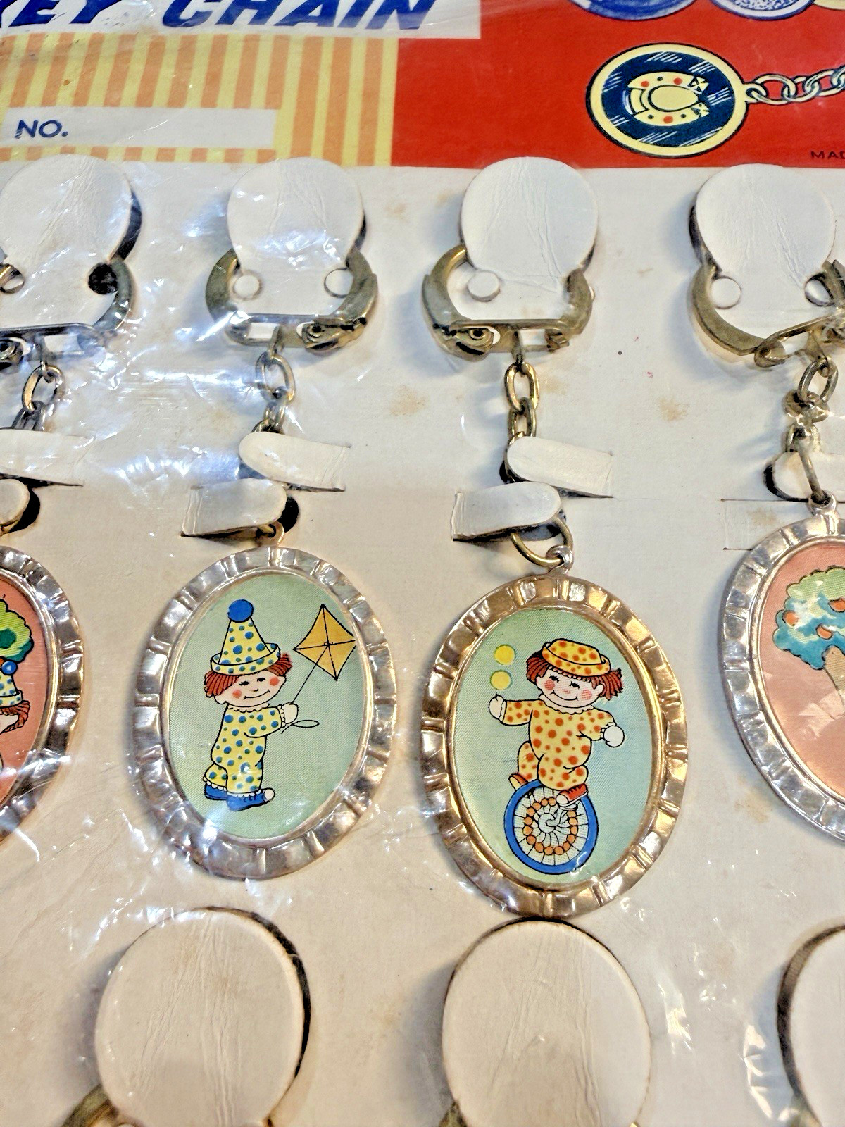 Vtg Novelty Key Chain ALUMINUM Playful Clown Charm Original Display of 12