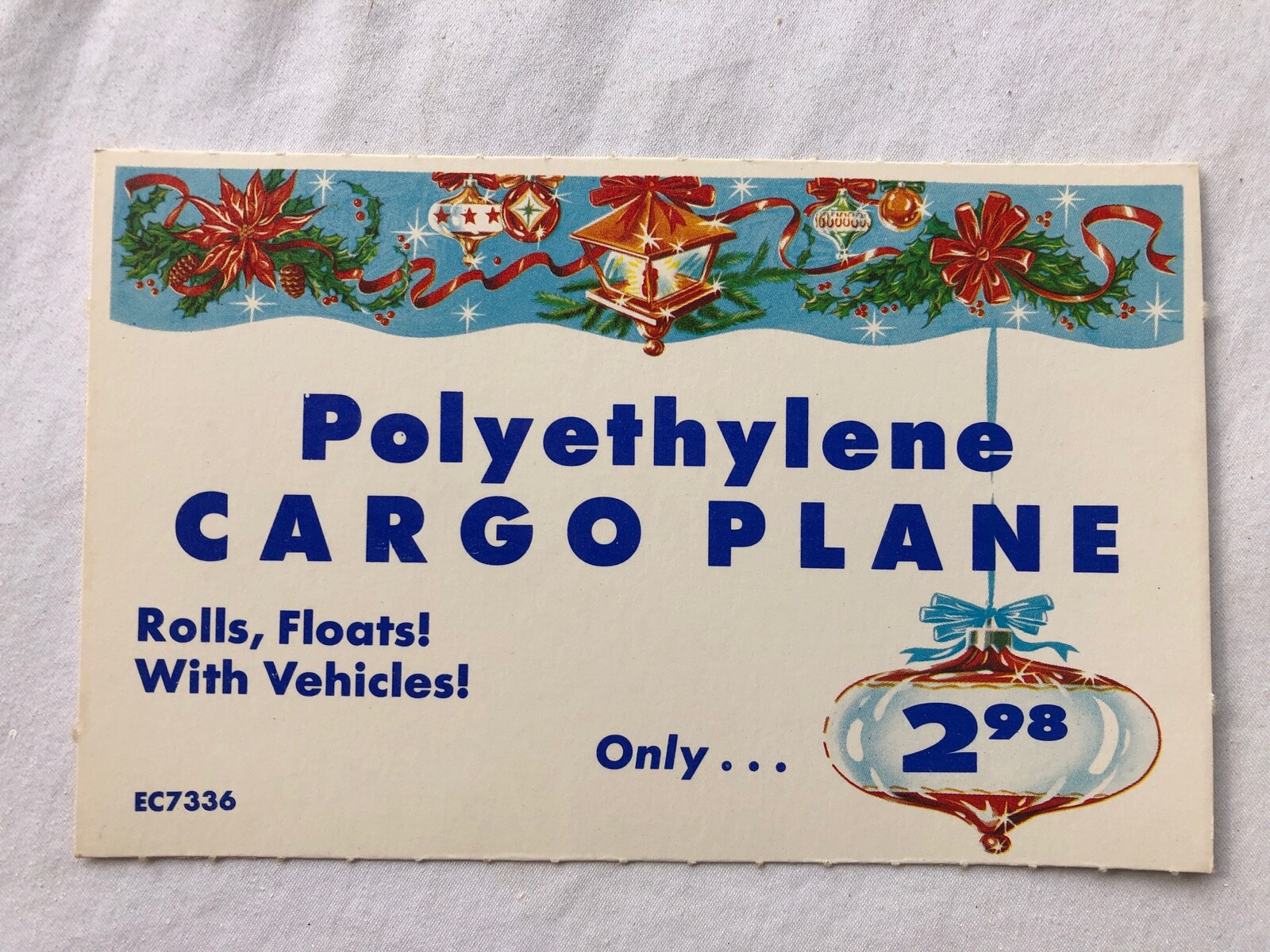 Vintage STORE SIGN PRICE CARD Polyethylene Cargo Plane Christmas Ornament #18