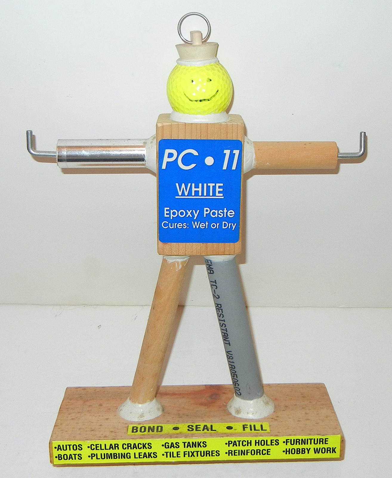 VINTAGE PC-11 EPOXY PASTE FIGURAL MAN STORE COUNTER DISPLAY SIGN