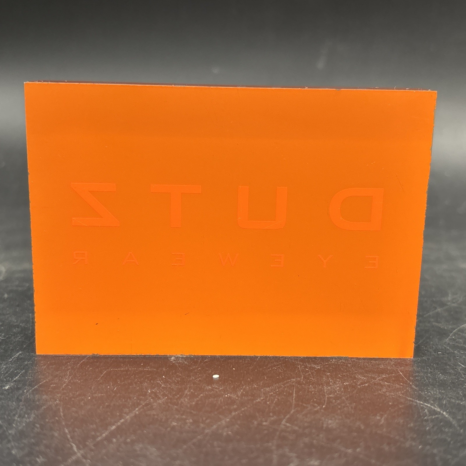 Dutz Eyewear Acrylic Retail Display – Orange Boutique Counter Sign