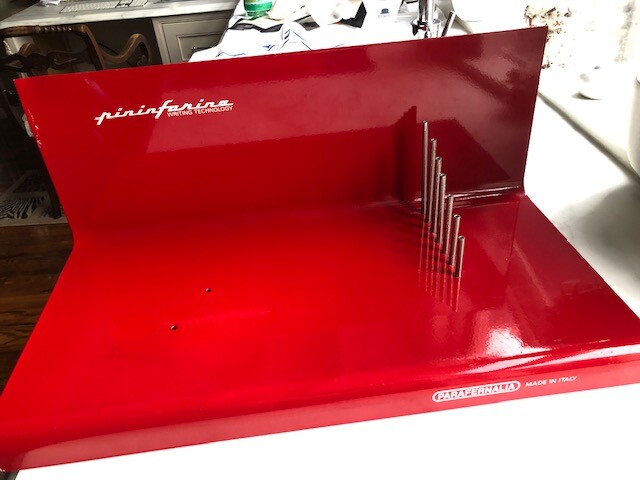 Pininfarina Ferrari dealer display curved aluminum