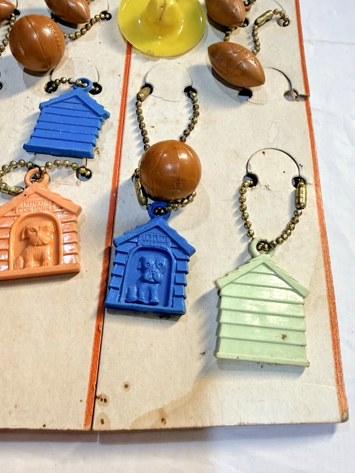 Vtg Novelty Key Chain Plastic Sports Dog House Cowboy Hat Original Display of 24