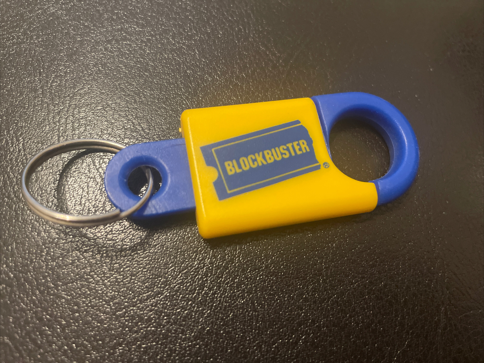 Vintage Blockbuster Video keychain blue and yellow plastic