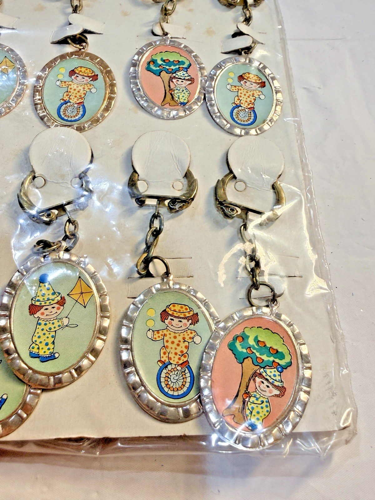 Vtg Novelty Key Chain ALUMINUM Playful Clown Charm Original Display of 12