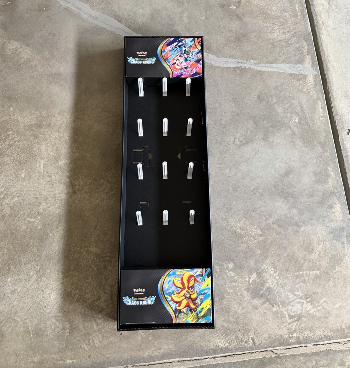 Pokémon TCG Mega Evolution Chaos Rising Display Stand, Black