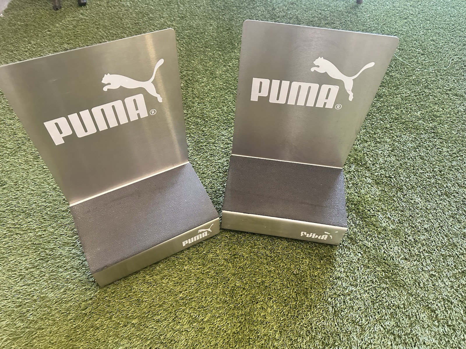 Stainless Steel Puma Shoe Display Advertisement