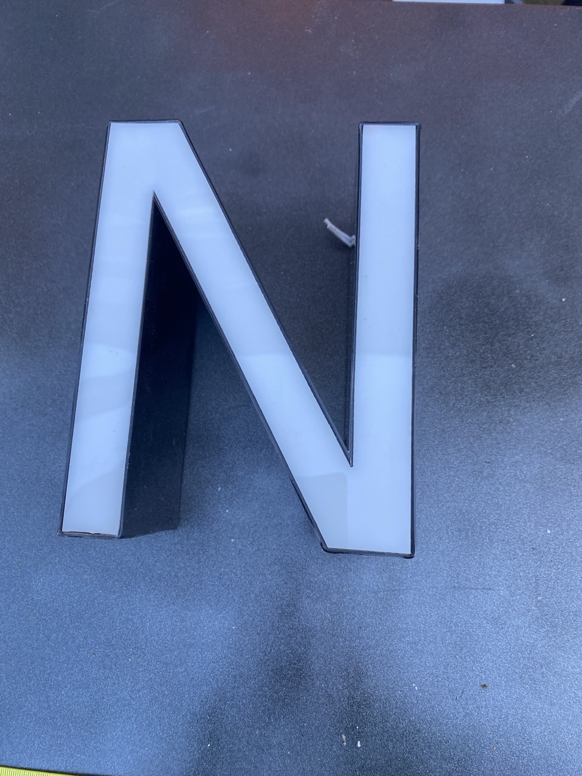 Letter n Ex Sign White Front Black Edge Plex