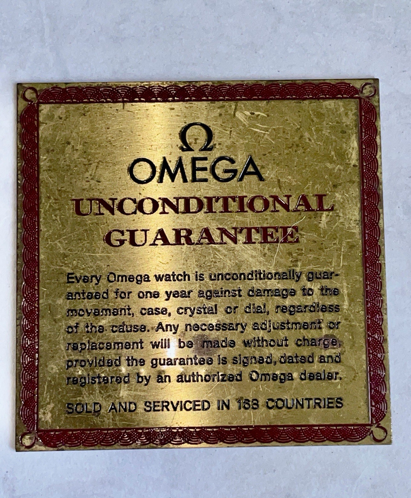 Vintage Omega Brass Display Advertising Plaque 3.5”