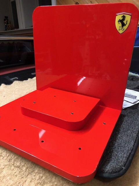 Ferrari Dealer Watch display with Extra Dealer sign and a Lamborghini sign