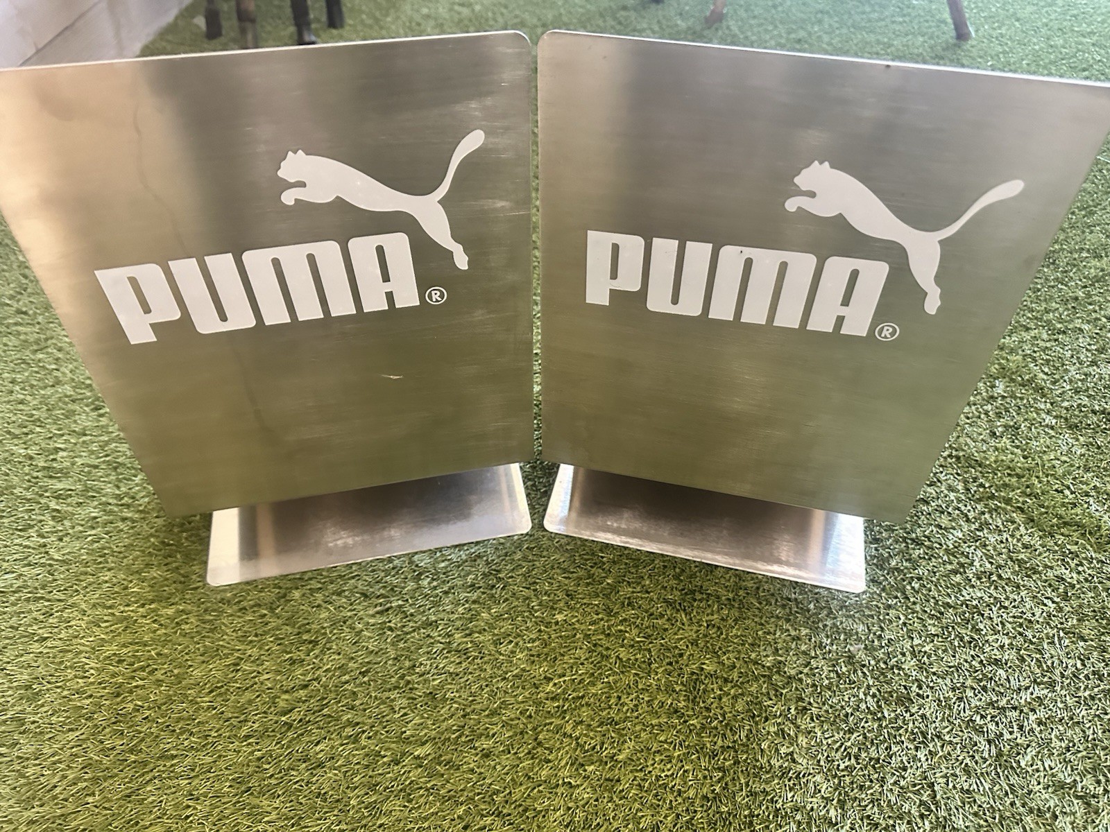 Stainless Steel Puma Shoe Display Advertisement