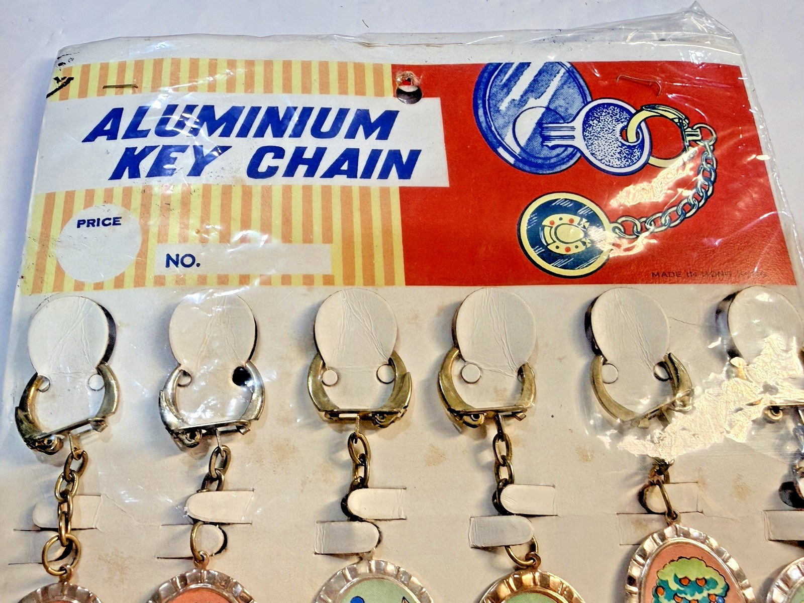 Vtg Novelty Key Chain ALUMINUM Playful Clown Charm Original Display of 12